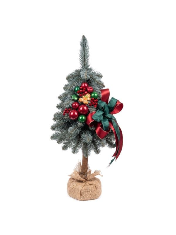 Kleiner k&uuml;nstlicher Weihnachtsbaum auf Stamm 65 cm vor wei&szlig;em Hintergrund, mit silbergr&uuml;nen Nadeln und festlichem Weihnachtsschmuck.